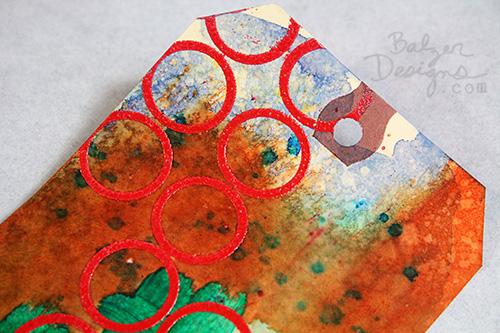 Detail of embossed circles on tag.