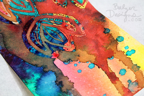 Close up of layers of color on tag.