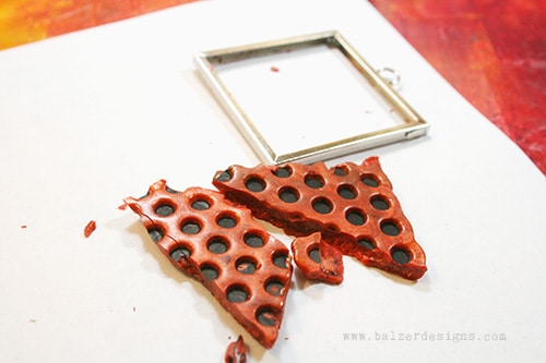 Cracked pieces of UTEE outside of the memory frame.